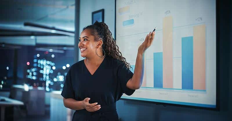 Woman making a business presentation using charts