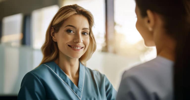 Medical professional smiling in conversation