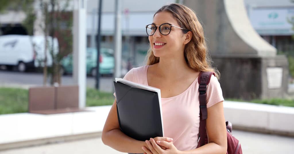 Young woman attending city campus